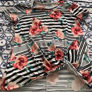 Black and flowered shirt